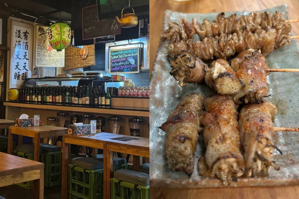 A composite image featuring two side-by-side photographs: On the left, a detailed view of a bustling, dimly lit Japanese Izakaya interior. The counter is lined with numerous bottles of sake and canned drinks, sitting beneath various Japanese lanterns, calligraphed signs, and a chalkboard menu with English listings like "Hamachi Kamashioyaki" and "Grilled Oysters Yaki." Wooden tables and green plastic crate stools populate the foreground, waiting for patrons. On the right, a close-up of a rustic ceramic plate laden with fresh, charred yakitori skewers. Two skewers of crispy chicken skin and several skewers of enoki mushrooms wrapped tightly in grilled pork belly, glistening with sauce and a dusting of chili flakes, rest on a wooden table.
