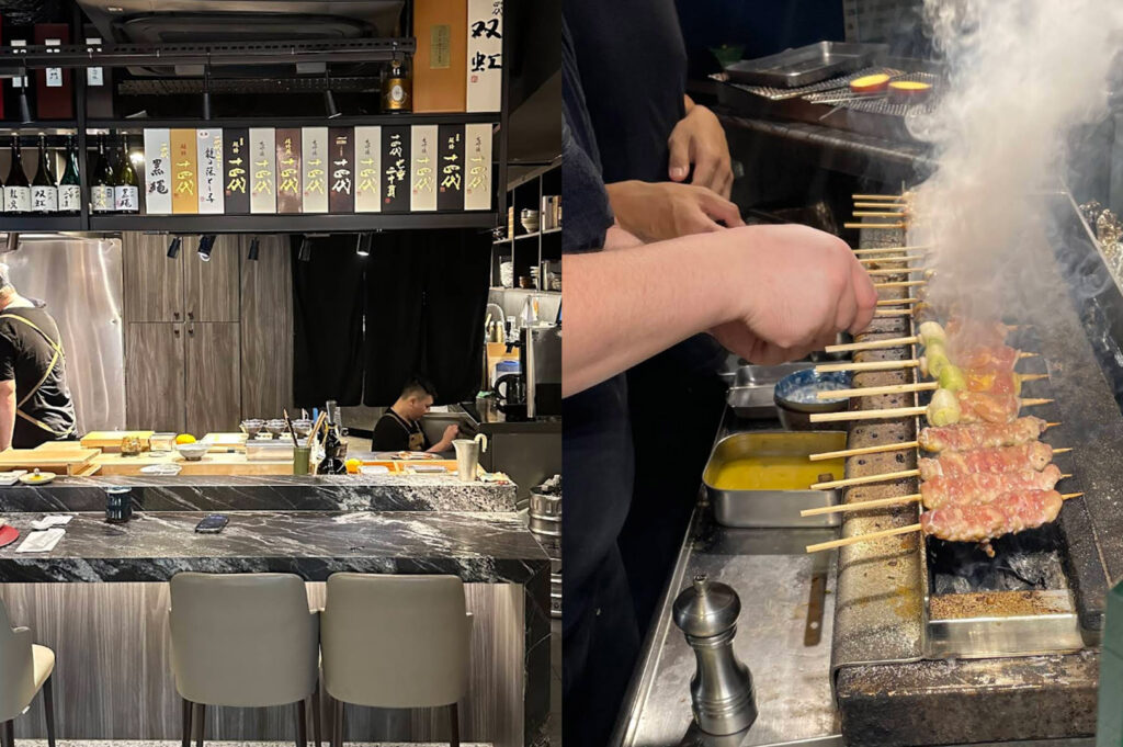 This side-by-side composite image showcases the interior and culinary craft of a modern Japanese izakaya. The left panel features a sleek, marble-topped counter with grey minimalist bar stools, looking into an open kitchen where a chef is meticulously preparing food. Above the workspace, a prominent display of premium sake bottles and boxes, including the prestigious Juyondai brand, is organized under professional spotlighting. The right panel provides a close-up, action-oriented view of a chef grilling several rows of yakitori skewers over a traditional charcoal grill. Thick plumes of white smoke rise as the meat and green onions sear, while a small metal container of basting sauce and a silver pepper grinder sit nearby on the stainless steel prep surface, emphasizing the sensory, handmade nature of the cooking process.